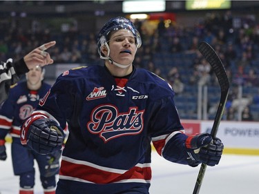 Regina Pats forward Adam Berg (#10) celebrates his game-winning goal against the Lethbridge Hurricanes at the Brandt Centre in Regina, Sask. on Sunday Nov. 15, 2015.