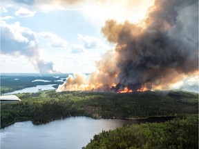Photo of forest fires and forest firefighting efforts in northern Saskatchewan taken by pilot Corey Hardcastle, a bird dog pilot for the Ministry of Environment out of La Ronge. Courtesy Corey Hardcastle.