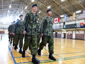Graduates from DP 1 Basic Military Qualification Co-operative Education Program 0153 high school military training course in Regina June 11, 2015.