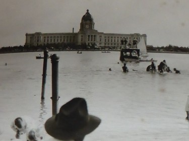 REGINA, SK : Nov. 9, 2015 -- Boaters on Wascana Lake in front of the new Saskatchewan Legislative Building, which was completed in 1912. Foliage and the presence of what appeared to be Campion College (opened in 1917 and now called the Regina Christian School) suggest this was taken after the First World War. (Photo: William John Brake Collection 2 via Wayne MacDonald)