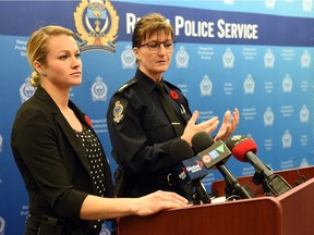 Police and  Crisis Team (PACT) members Jesse Barre (L) with the Regina Qu'Appelle Health Region and Sgt. Colleen Hall (R) with the Regina Police Service speaking at a  news conference.