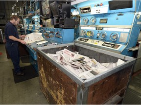 Press workers proof a test printing of the new Regina Leader-Post.