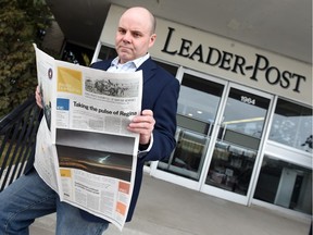 Regina Leader-Post editor Stephen Ripley checks out a test copy of the reimagined print edition of the paper before Tuesday's launch.