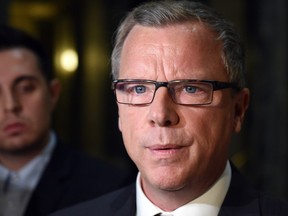 Saskatchewan Premier Brad Wall is concerned about the refugee screening process in the wake of the Paris attacks.
