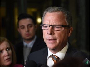 Saskatchewan Premier Brad Wall speaks in the legislative building rotunda on Nov. 16 on asking the federal government to suspend the current plan to bring 25,000 Syrian refugees into the country.
