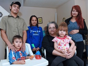 Roselena Laferte (seated) holding her great grandchild Aaliyah, with  grandchildren and great grandchildren.  (L-R) Great grandchild Davin Shepard, grandchildren Marco Laferte, Krislena Laferte and Cheyenne Laferte.
