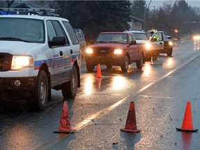 Members of the Regina police service investigate a vehicle pedestrian accident that sent a man to hospital on the 5100 block of Sherwood Drive in Regina, SK on November 18, 2015.