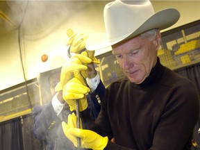 Barry Andrew, who was named to the Saskatchewan Agricultural Hall of Fame Friday, took part  in the ceremonial burning of the brand to kick off the 40th anniversary edition of the Canadian Western Agribition in Regina  November 19, 2010.