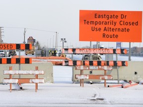 Crews work on the Service Road bridge on Eastgate Drive. North of Victoria at Coleman Crescent in Regina on Thursday.