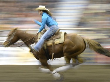 April Williamson, of Mankota SK, competes in Ladies Barrel Racing during the Canadian Cowboys Association Finals Rodeo at the Canadian Western Agribition in Regina on Thursday.