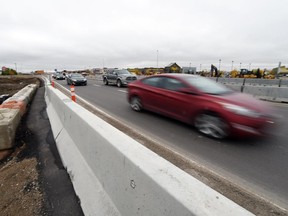 Construction work being done around on the bridge on Eastgate Drive just east of Coleman Crescent in Regina on October 5, 2015.