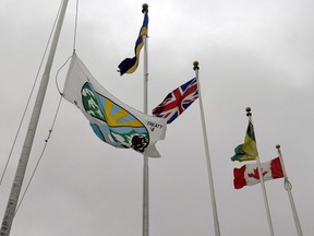 The Treaty 4 flag in front of Regina's city hall beside the Canada Saskatchewan and Regina flags.