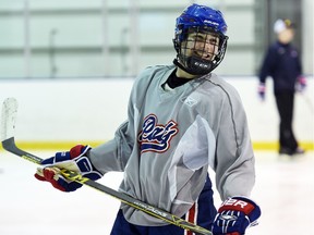 Pat Canadians' Turner Ripplinger during practice at the Co-operators Centre in Regina on October 21, 2015.