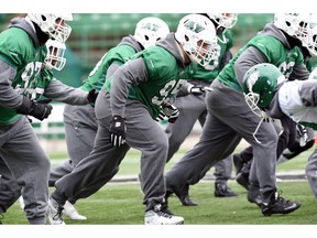 Saskatchewan Roughriders defensive linemen practice at Mosaic Stadium in Regina on October 29, 2015.