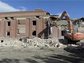 Crews demolish Connaught Community School.