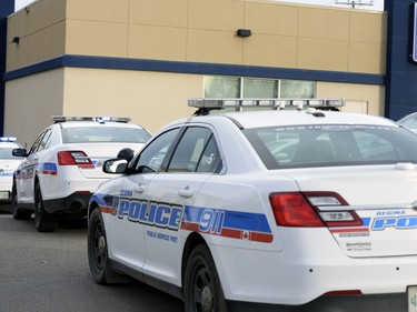 Regina Police Service cars parked outside the RBC on the 5800 block of Rochdale Boulevard on Tuesday.