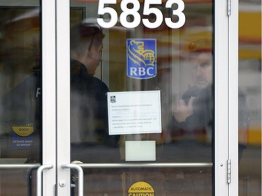 Regina Police service officers inside the RBC on the 5800 block of Rochdale Boulevard to investigate an incident on Tuesday.