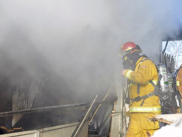 Photos of garage fire on the 600 block Retallack St. November 19, 2015.