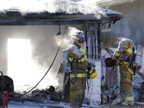 Police fire and EMS responded to a garage fire on McNaughton Ave. in Regina on Thursday.