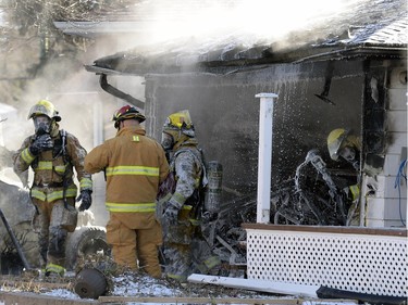 Police fire and EMS responded to a garage fire on McNaughton Ave. in Regina November 18, 2015.