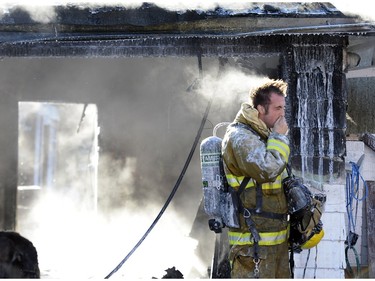 Police fire and EMS responded to a garage fire on McNaughton Ave. in Regina November 18, 2015.