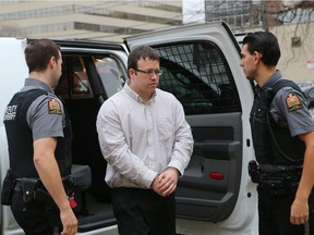 Douglas Hales heads into Queens Bench Courthouse on October 22, 2014 in Saskatoon.