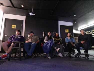 Spectators watch a match being projected onto a wall at SKLeague eSports tournament held at Matrix Gaming Centre in Regina, Sask. on Saturday Nov. 7, 2015. (Michael Bell/Regina Leader-Post)