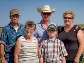 Triple A Hereford Ranch, located outside of Moose Jaw is a fourth generation ranch owned by the Andrews family. Left to right: Parents Russell and Faye, Murray, son Luke and wife Bridget.