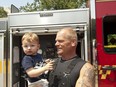 Mike Holmes with grandson.