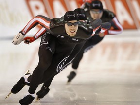 William Dutton, of Humboldt, leads his team to a first place finish in the men's team sprint at a speed skating World Cup event Sunday, Nov. 22, 2015, in Kearns, Utah.