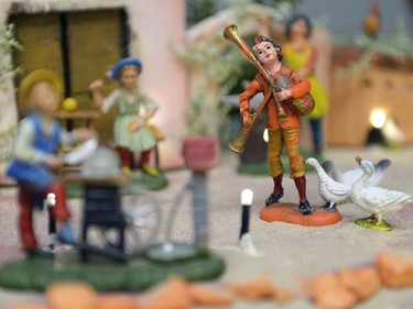 A bag piper figurine is part of a presepio at the home of Orazio Giannini in Regina, Sask. on Sunday Dec. 6, 2015. The model illustrates aspects of the Christmas story, set in an Italian context. Michael Bell/Regina Leader-Post