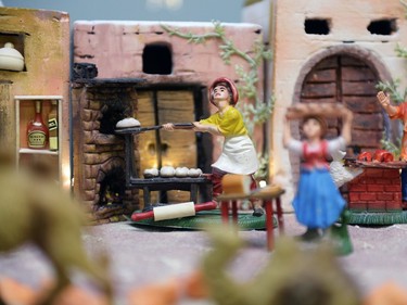 A baker figurine is part of a presepio at the home of Orazio Giannini in Regina, Sask. on Sunday Dec. 6, 2015. The model illustrates aspects of the Christmas story, set in an Italian context. Michael Bell/Regina Leader-Post