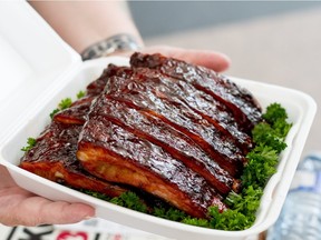 The best of Regina in 2015 includes a box of tantalizingly delicious pork ribs for the judges at Pile O Bones Barbecue Championships.