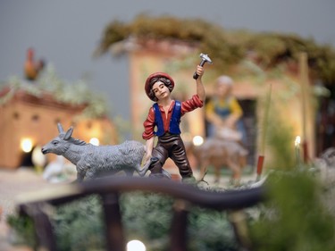 A farmer figurine is part of a presepio at the home of Orazio Giannini in Regina, Sask. on Sunday Dec. 6, 2015. The model illustrates aspects of the Christmas story, set in an Italian context. Michael Bell/Regina Leader-Post