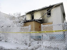 A house sits gutted by fire in the 1800 block of Osler St. in Regina, Sask. on Sunday Dec. 6, 2015. Michael Bell/Regina Leader-Post