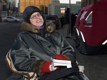 BeanSauer waits on the sidewalk to buy mead at Bushwakker Brewpub in Regina, Sask. on Saturday Dec. 5, 2015.