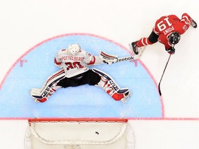 Canada's Brayden Point, a member of the Moose Jaw Warriors, scores in a shootout against Swiss goalie Joren van Pottelberghe during preliminary-round action at the world junior hockey championship on Tuesday.