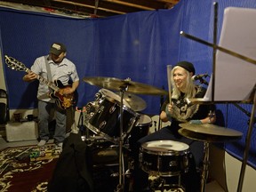 Dale McArthur, left, and Val Mcleod, right, rehearse in McArthur's basement in Regina, Sask. on Sunday December 27, 2015.