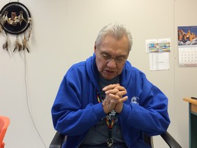 Elder Noel Starblanket sits in his office at Scott Collegiate Community High School and reflects on the final report by the Truth and Reconciliation Commission.