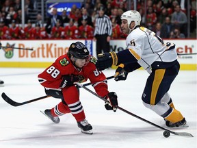 Nashville Predators defenceman Barret Jackman, shown here facing Patrick Kane and the Chicago Blackhawks on Dec. 8, 2015, has taken on a mentoring role with the Preds.
