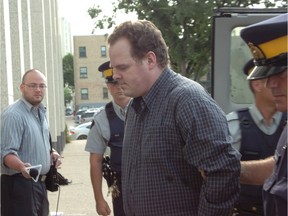 Peter Whitmore enters  Regina Queen's Bench Court on July 23, 2007.