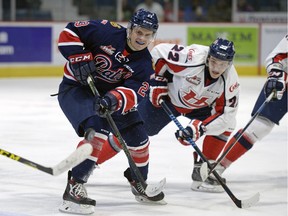 The Regina Pats' Sam Steel, left, aspires to eventually play for Team Canada at the world junior hockey championship.