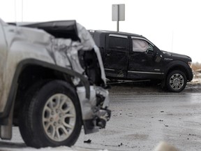 Two trucks are damaged after a collision at the slippery intersection of Prince of Wales Dr. and Jenkins Dr. in Regina on Saturday Jan. 24, 2015.