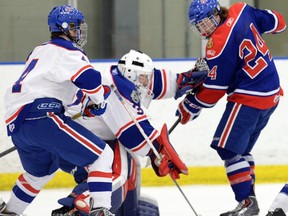The Regina Pats have signed defenceman Riley Bruce (left), shown here during the Pats' Blue and White game in 2014.