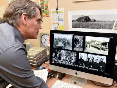 Donald Johnson, a special media archivist working on a World War I photo  montage from the 1915 at Saskatchewan Provincial Archives in Regina on December 10, 2015.