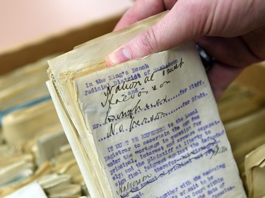 Legal documents from King's Bench Judicial District of Saskatoon at Saskatchewan Provincial Archives in Regina on December 10, 2015.