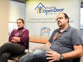 Laura Stone (L) and Ziad Al-Husseini with the Regina Open Door Society talking  about cultural awareness for the Syrian refugees coming to here.