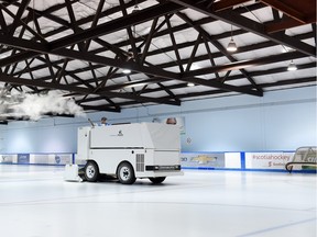 DECEMBER 14, 2015 -- Rink attendant Colter Kress uses a Zamboni to clean the ice surface at the Jack Staples Arena in Regina on December 14, 2015.  Saskatchewan has a community rinks program that gives grants to smaller hockey and curling rinks around the province for upkeep of those facilities.