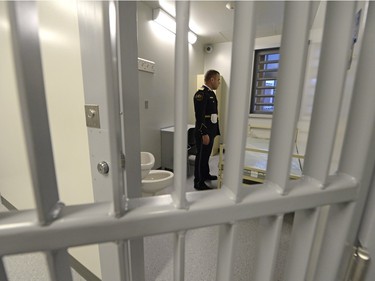 Ian Brooks, staff training officer with Correctional Service of Canada, tours media through the tour the new Correctional Service of Canada training academy located at the RCMP Depot in Regina on Nov. 16, 2015.