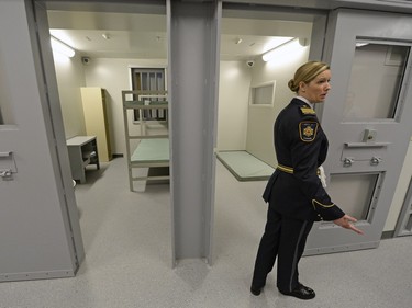 Jennifer Brand, staff training officer with Correctional Services Canada, tours media through the tour the new Correctional Service of Canada training academy located on RCMP Depot in Regina on Wednesday.
